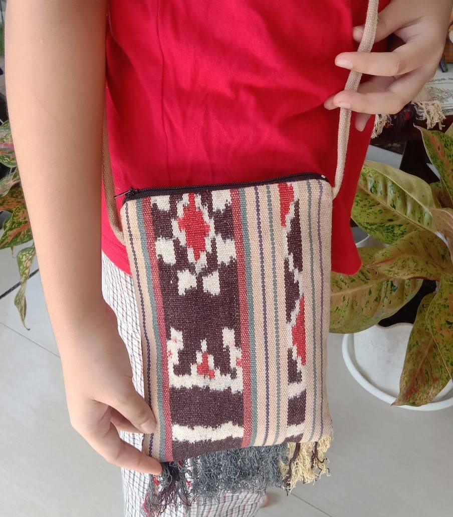 tas samping motif