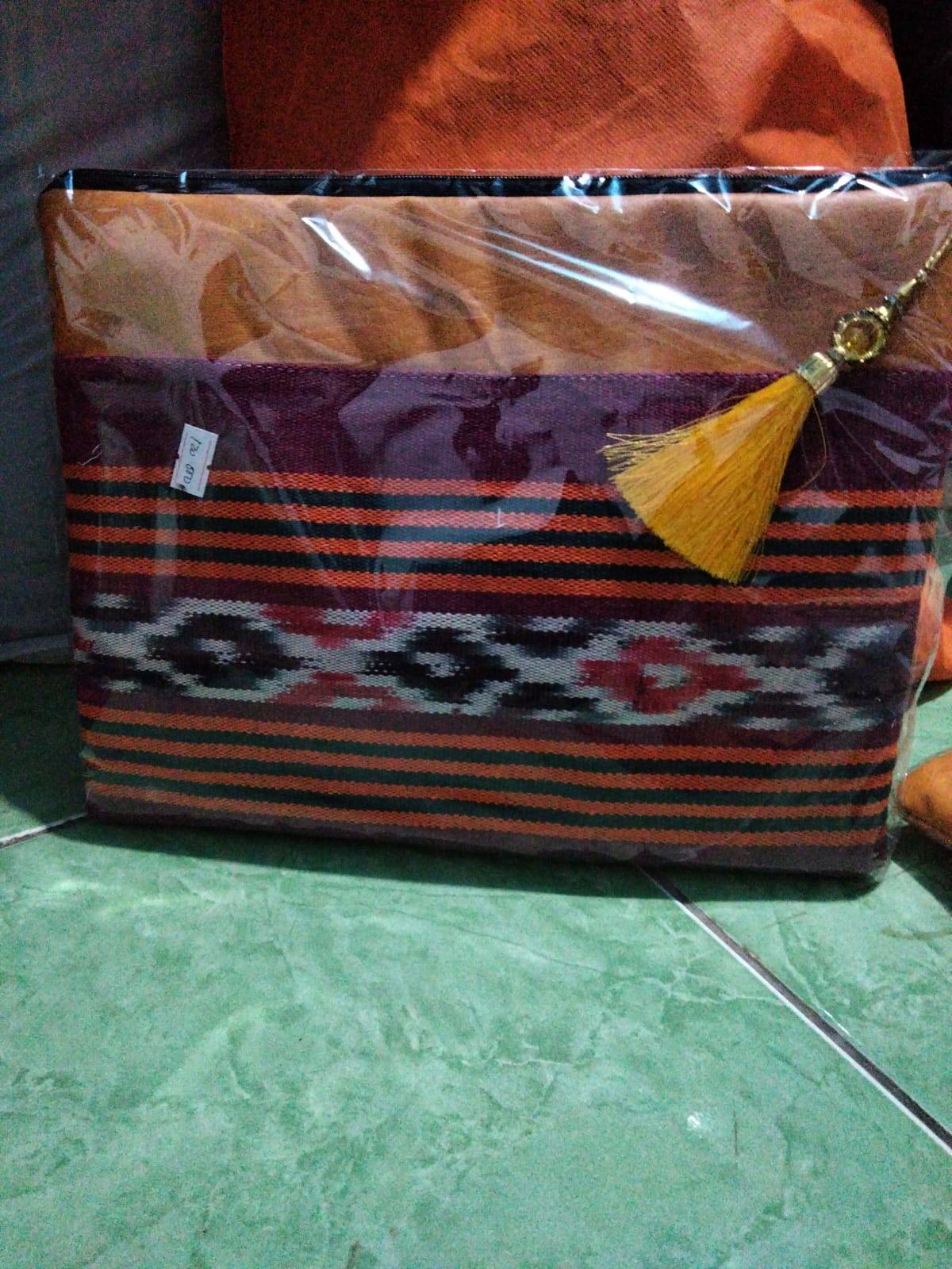 tas samping motif